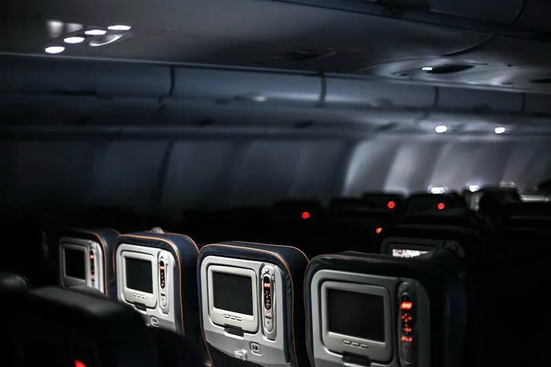 A plane's interior, with empty seats